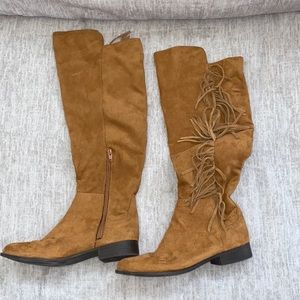 Tall fringe boots